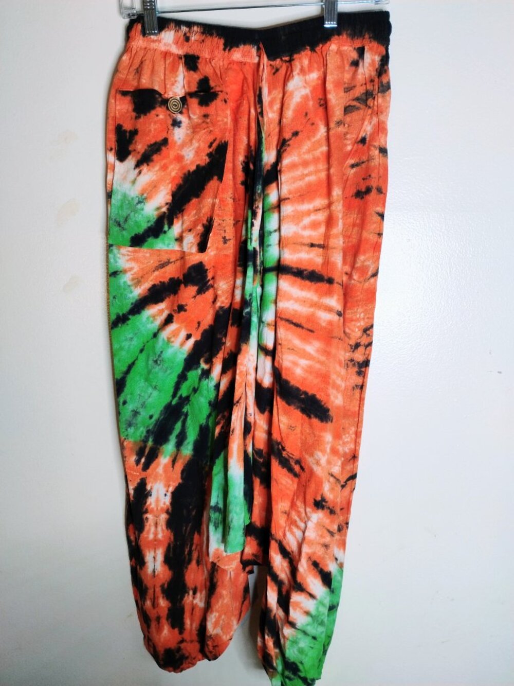 Orange and green tie dye harem pants
